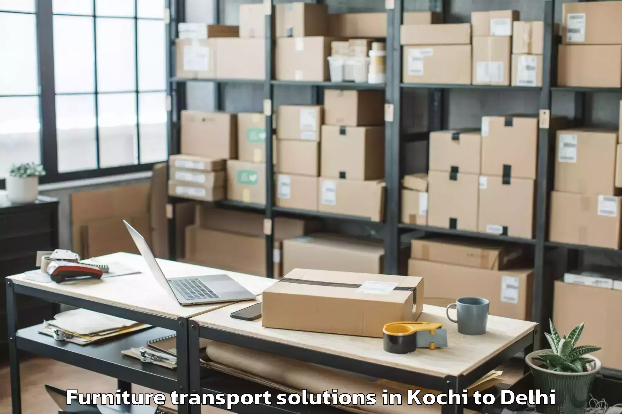 Book Kochi to Vivek Vihar Furniture Transport Solutions Online